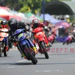 Tomy Borong Podium