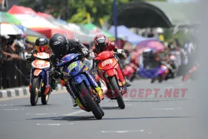 Tomy Borong Podium